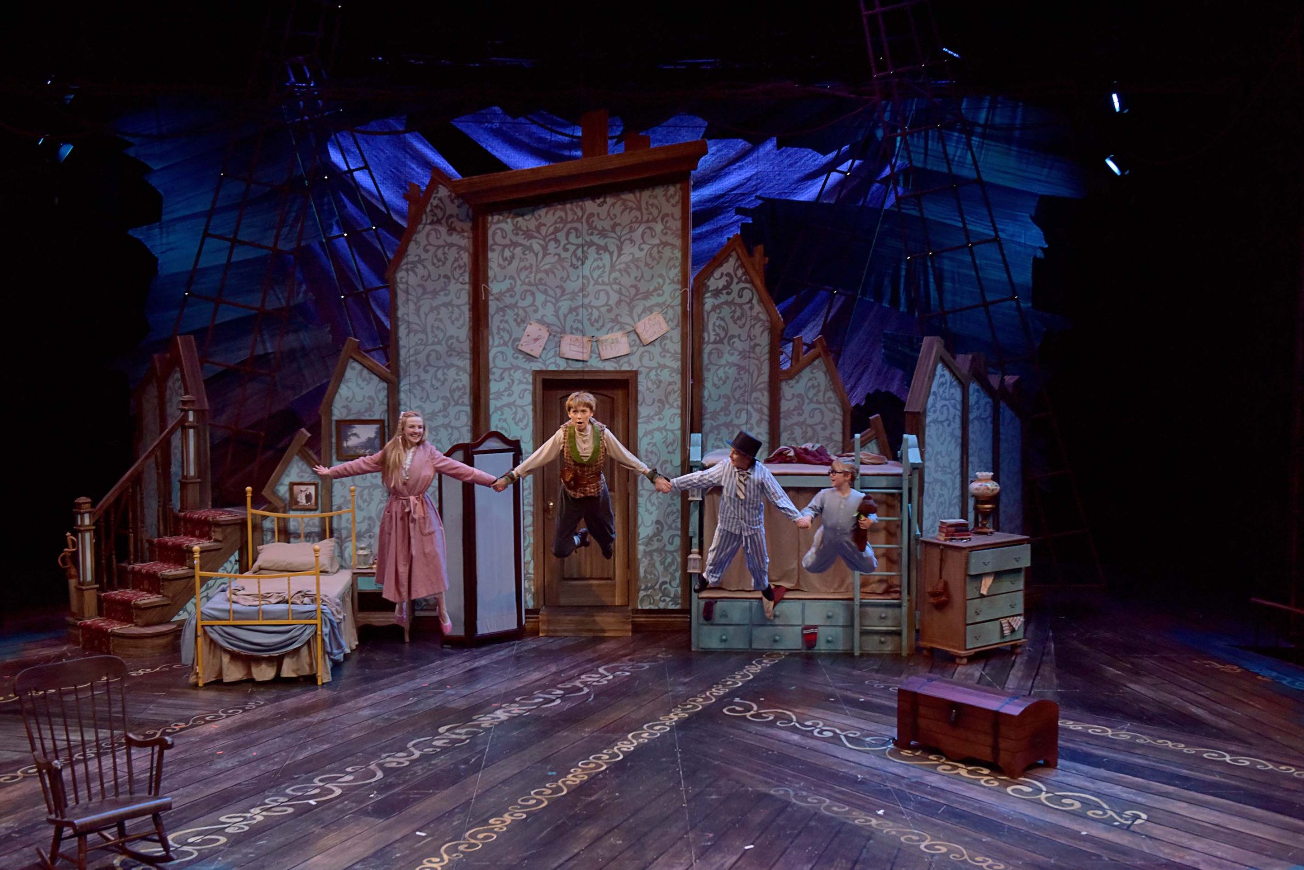 Young Actors flying on stage in Peter Pan