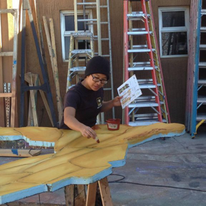 Tech student painting set pieces