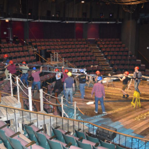 Group of tech students loading materials into the Marian