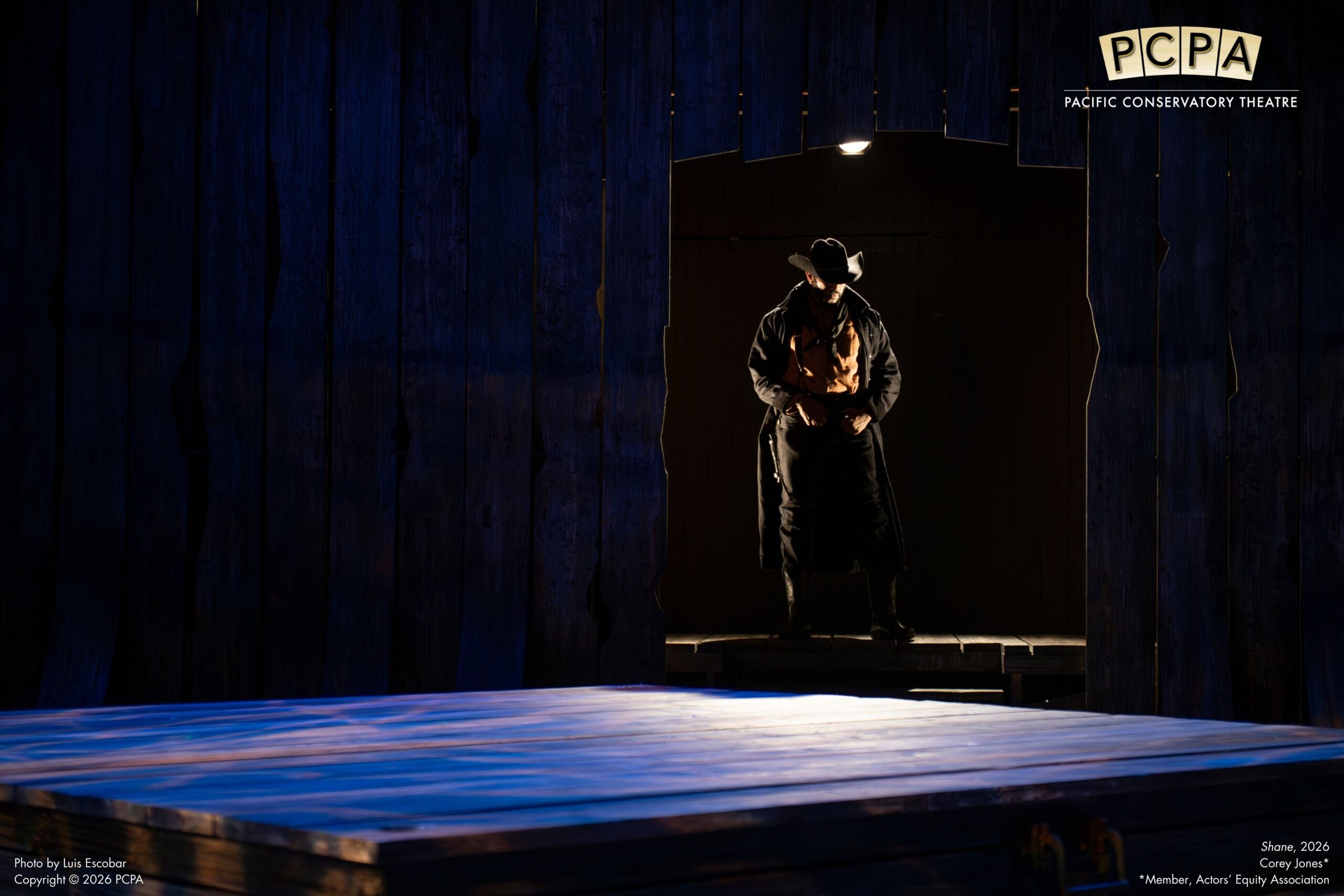 Man standing in the dark doorway