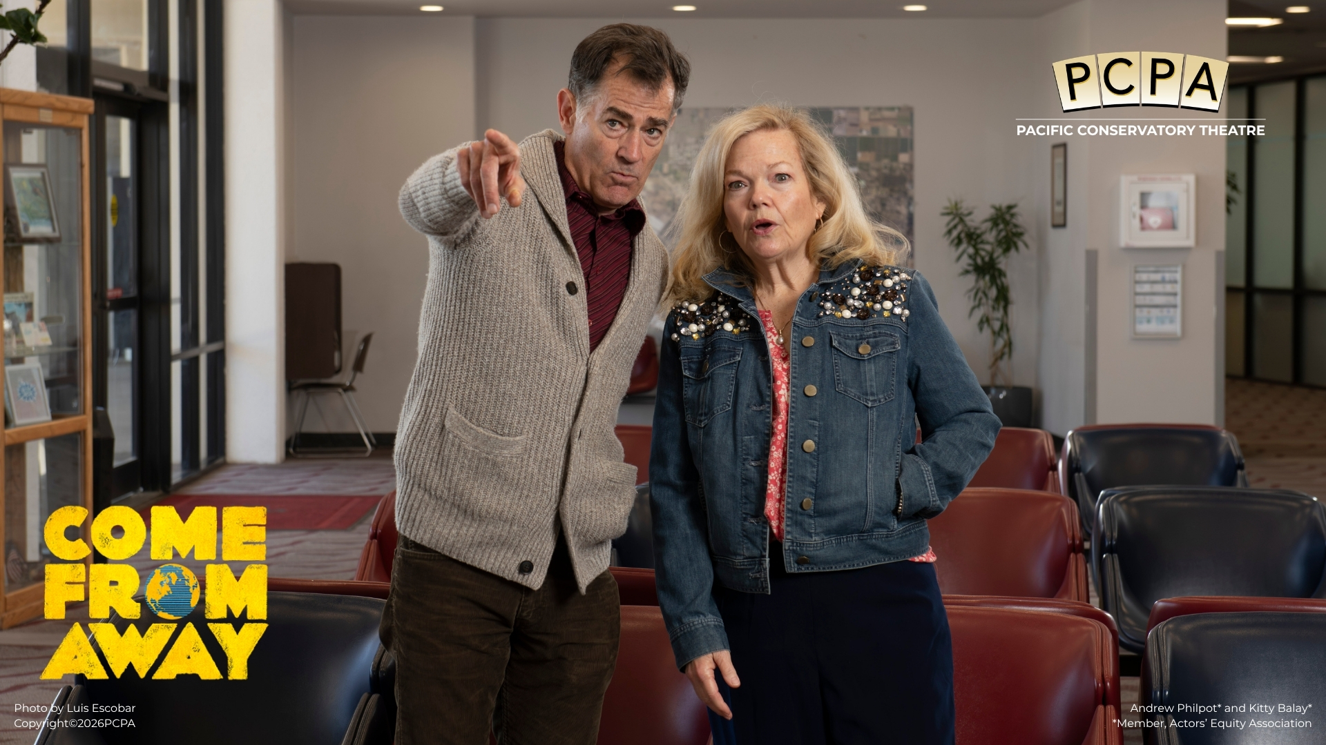 Two actors standing together looking into the distance while pointing